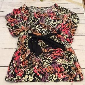 Black jungle print mini dress with adorable with black bow detail.